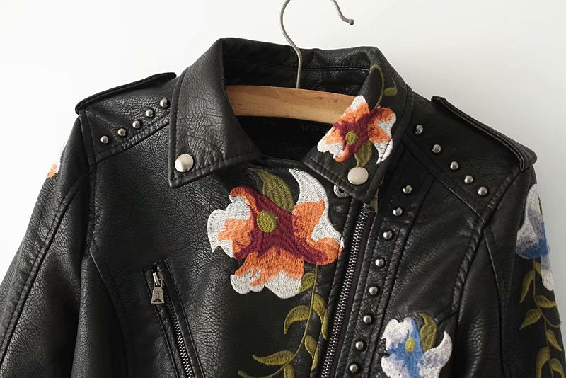 Embroidered studded leather jacket